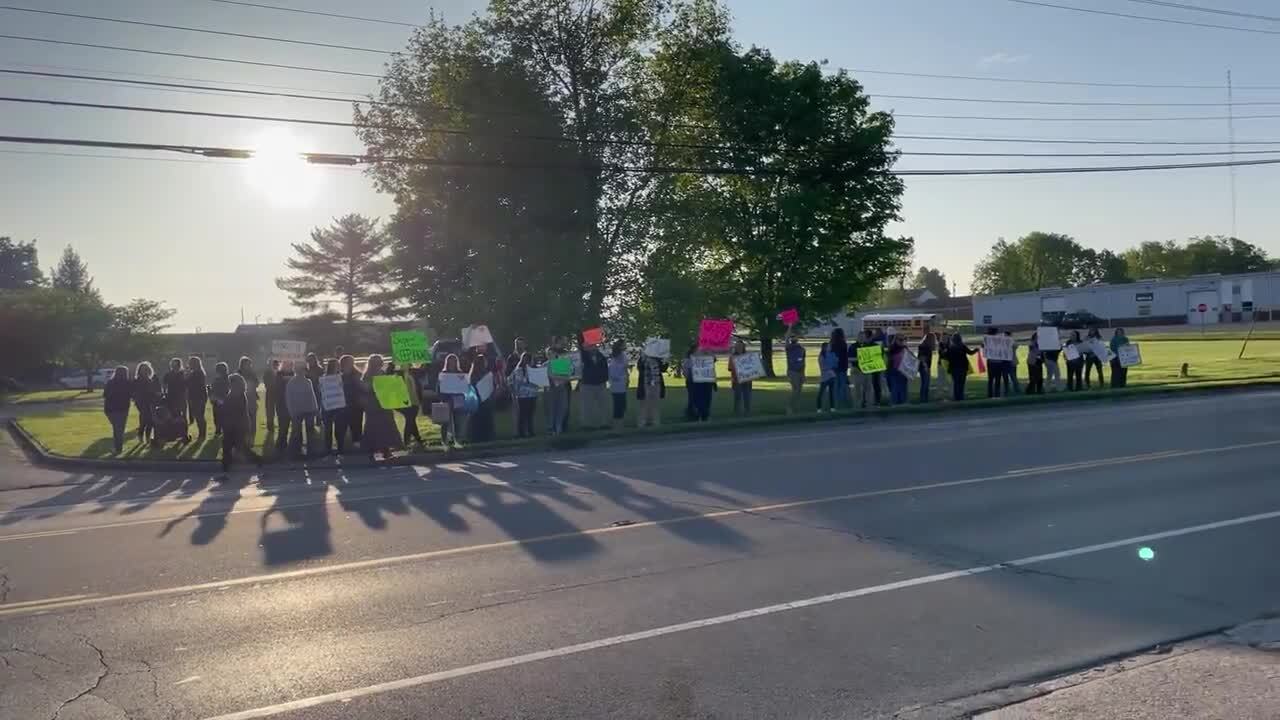 Demonstrators gather at Central Kentucky high school to protest principal’s demotion