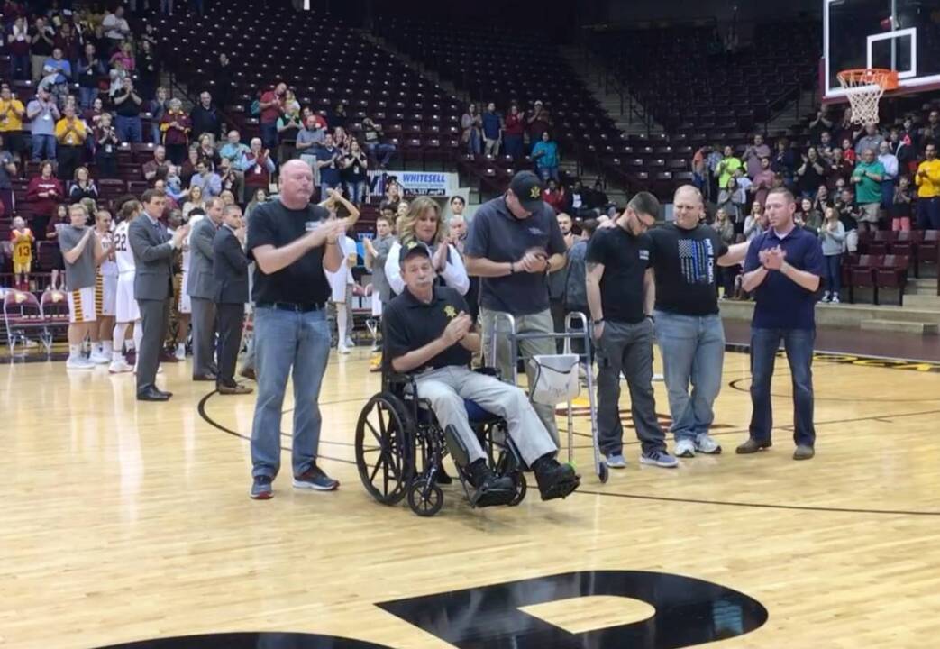 York County officers who limped, were wheeled to free throw line scored with the crowd