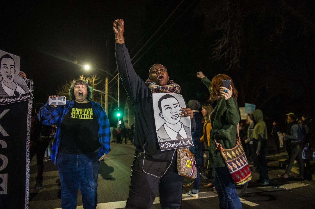 Protesters make speeches at the Stephon Clark protest