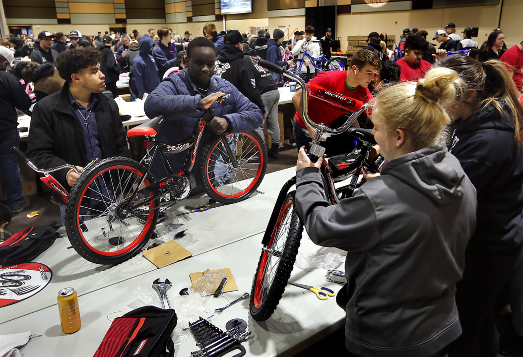 Building bikes with Christmas cheer for Tri-Cities tikes
