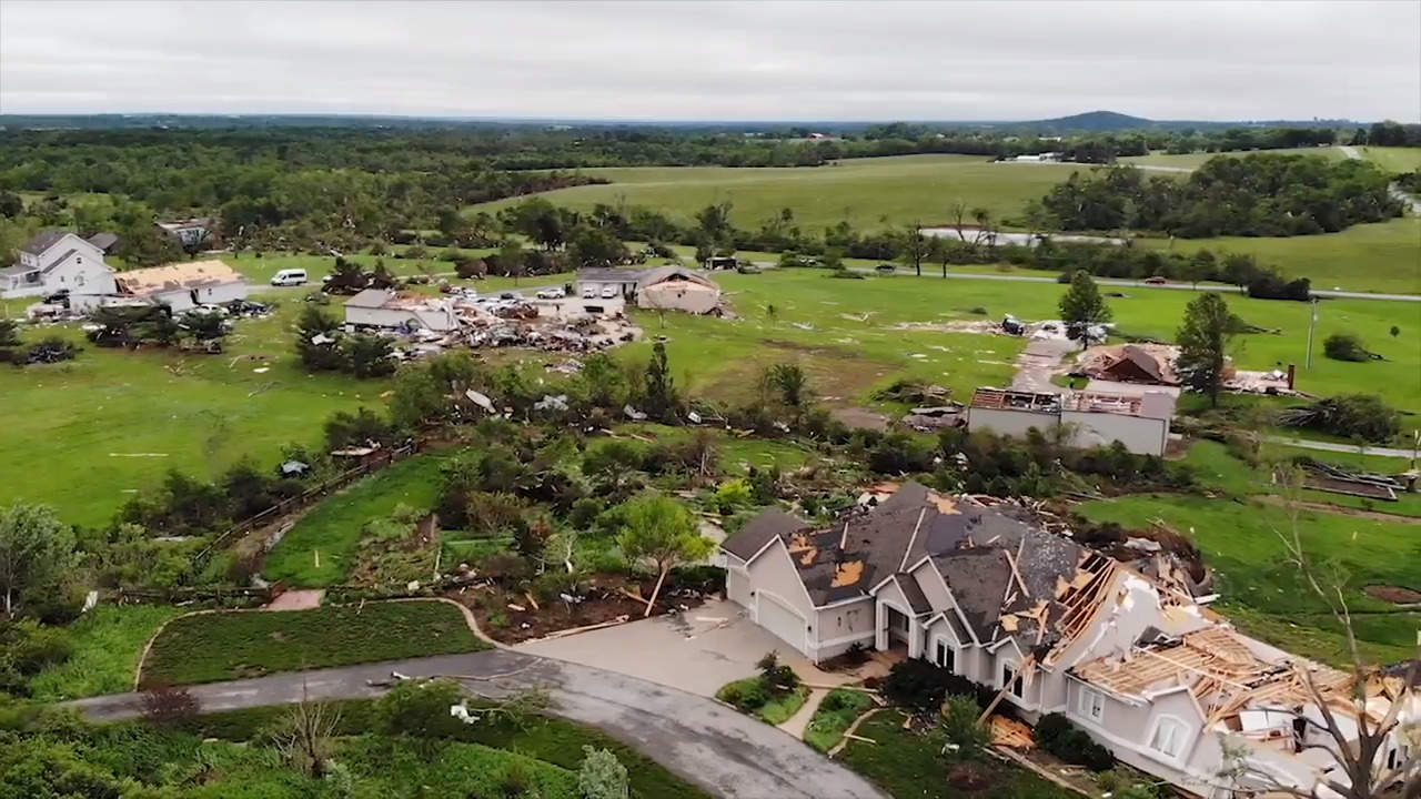 Aerial views of homes damaged by tornado in southern Lawrence