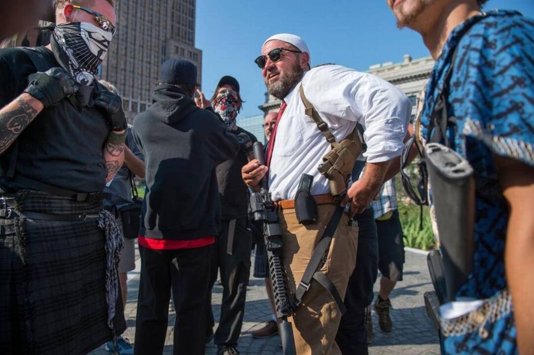Trump protesters pack big guns