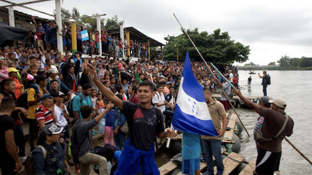 Mexico promises humanitarian response to caravan, but migrants break barriers anyway.