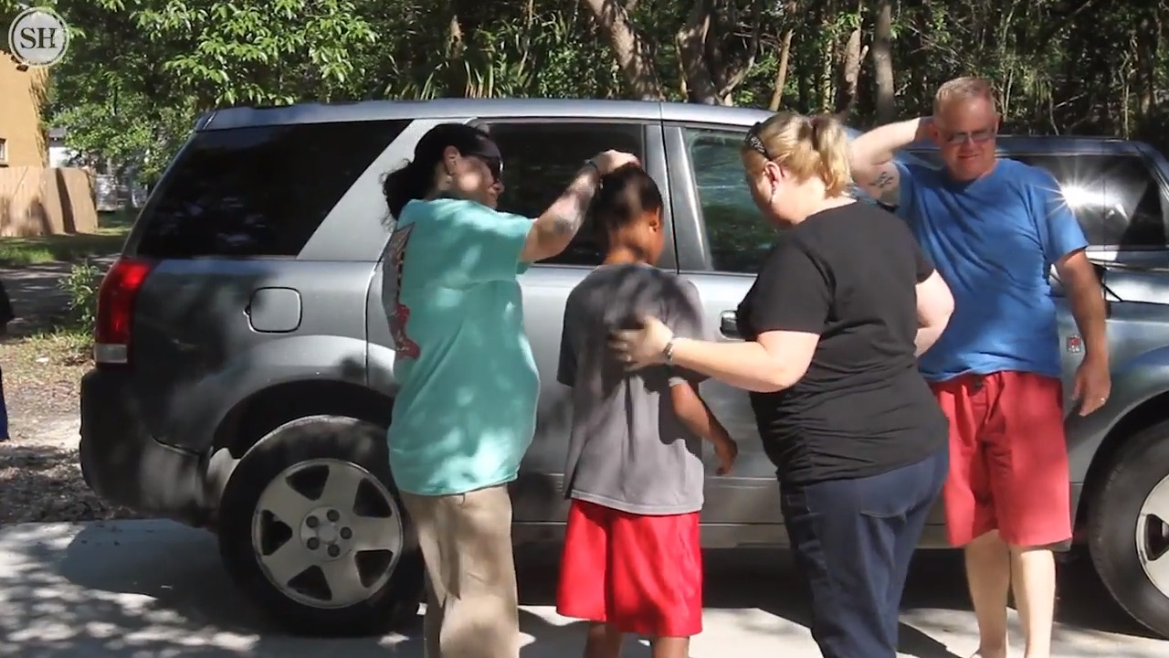 Alone at birth, boy now has three parents after paperwork error