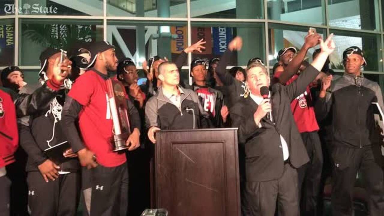 USC AD Ray Tanner talks with crowd at team arrival