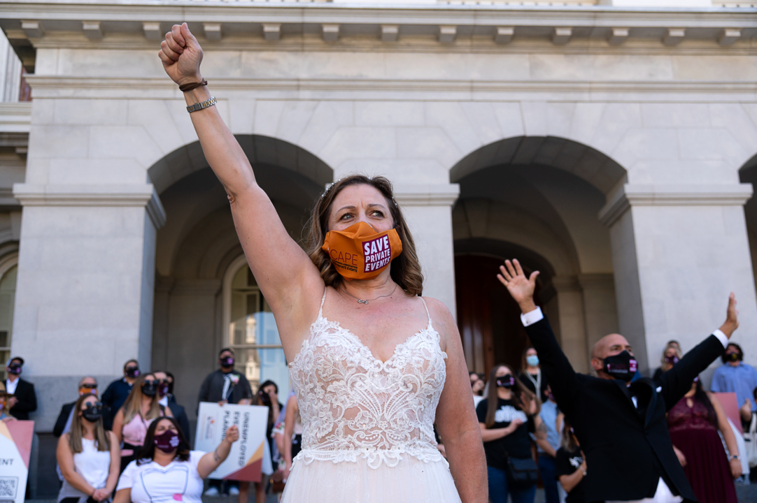 ‘The event industry has been forgotten.’ See protesters march in wedding gowns and tuxes