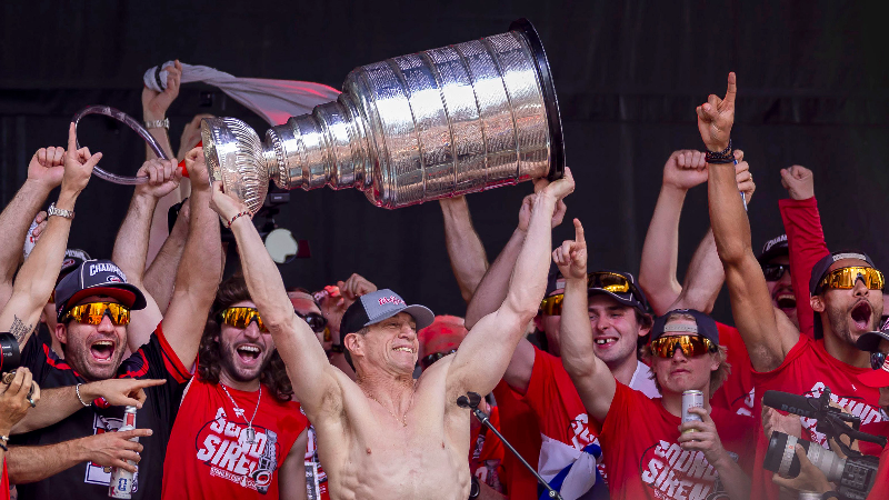 'Rod the Bod' hoists the Stanley Cup during the Canes rally in downtown Raleigh