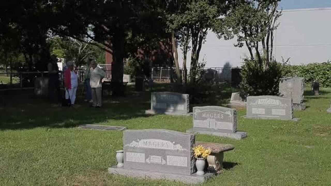 Old North Texas cemeteries being surrounded by shopping centers, motels