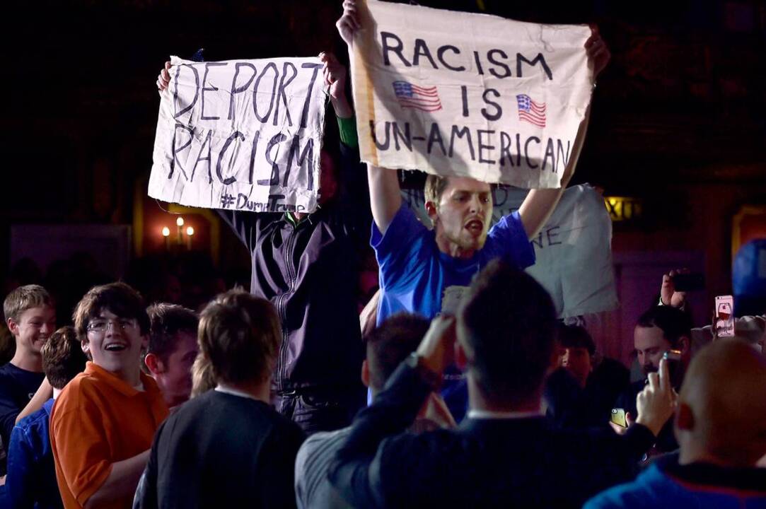 Protesters at Trump rally temporarily stop event