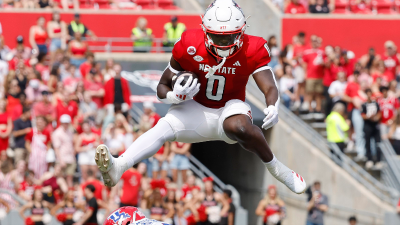 NC State running back hurdles LA Tech defender in college football win