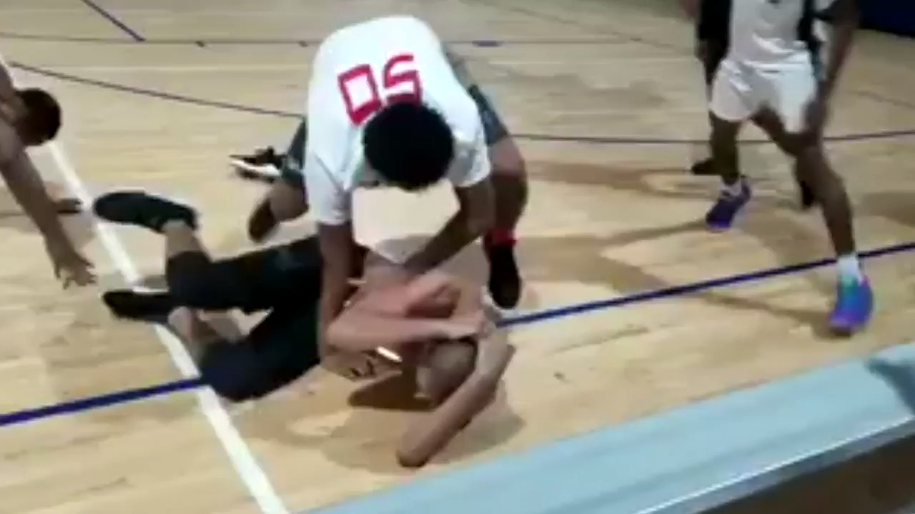 Chaos erupts in massive brawl between referees, players at AAU game