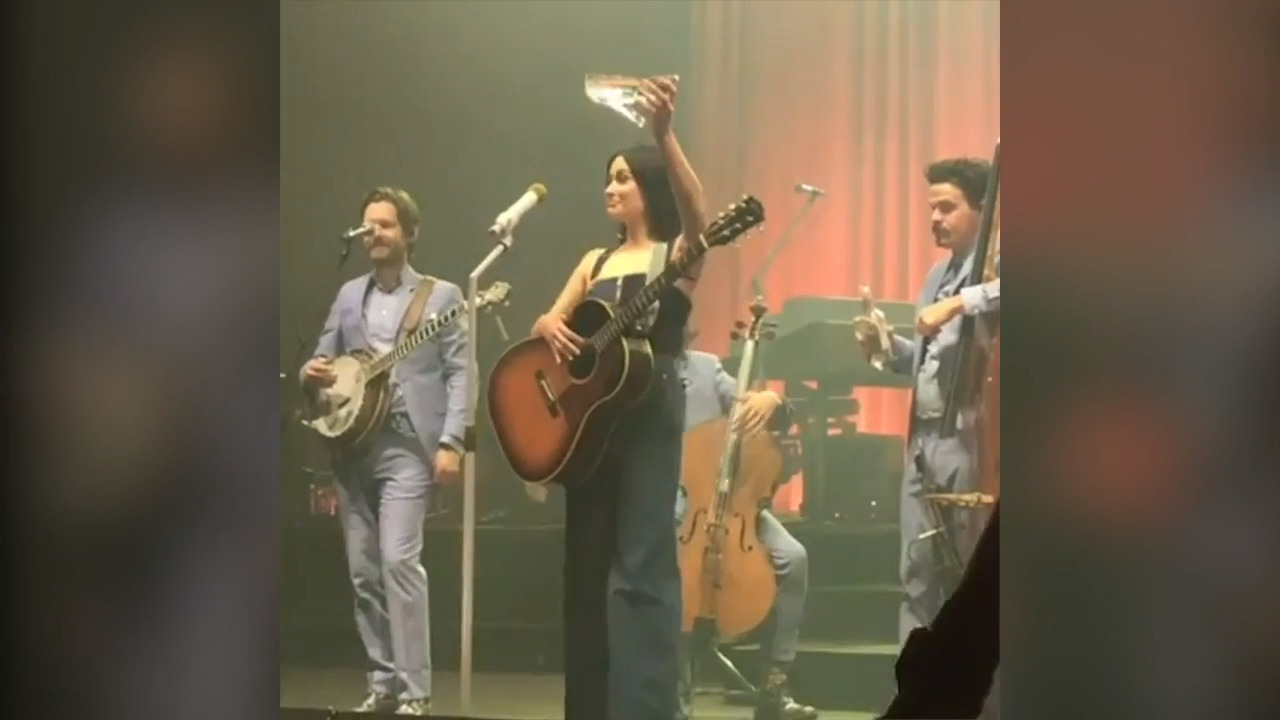 Kacey Musgraves does glass slipper ‘shoey’ in Melbourne