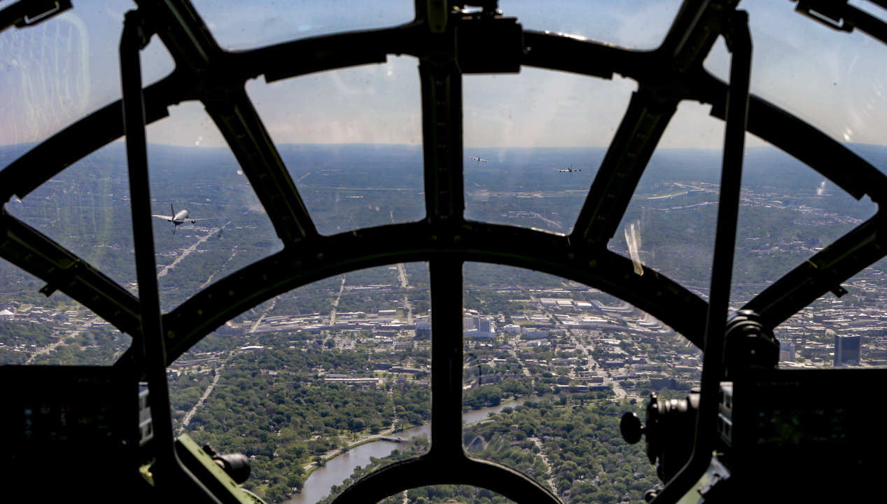 Warplanes from the past and present fly over Wichita to honor coronavirus workers