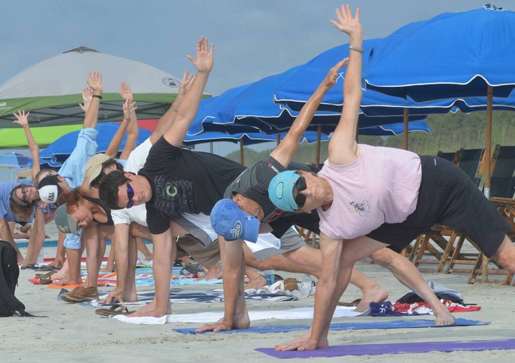 Come and get your free beach yoga