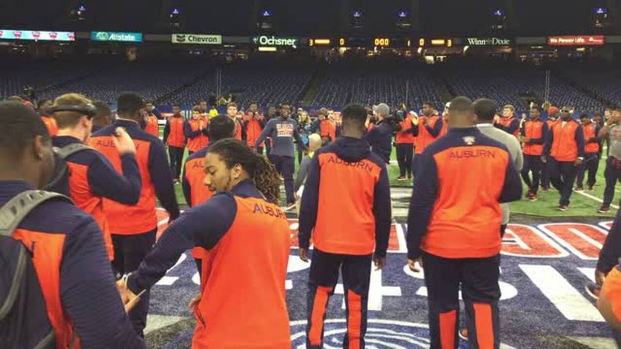 ‘Let’s go’ Auburn players gather on field at Superdome for Sugar Bowl