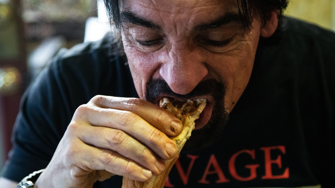 Man chows down 27 hot dogs to claim Roast Grill record