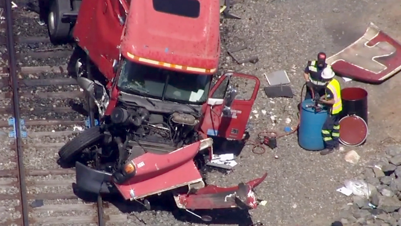 Train collides with tractor-trailer in Durham