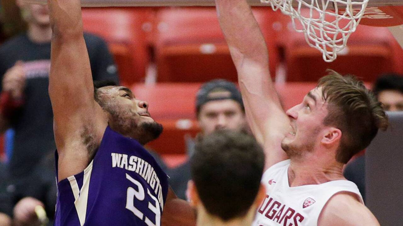 Carlos Johnson’s 'grime' brings UW a 70-65 win over WSU