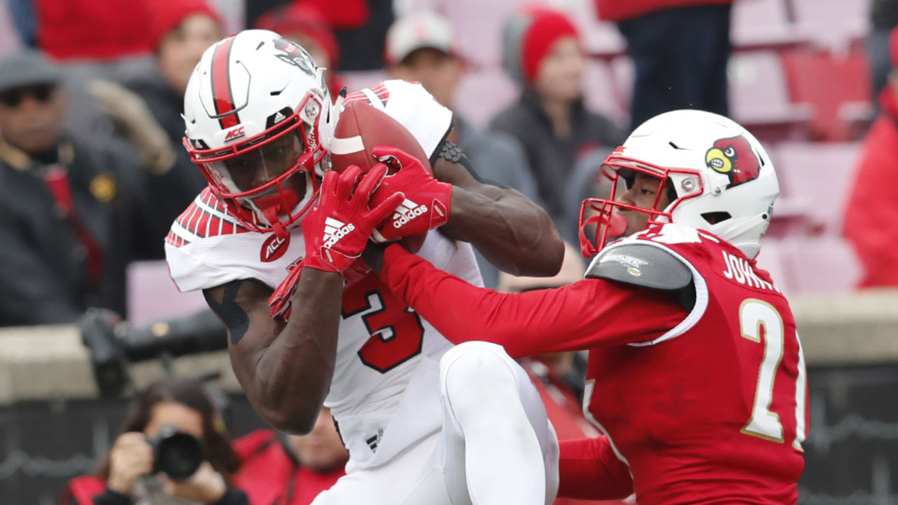 NC State blasts hapless Louisville, 52-10