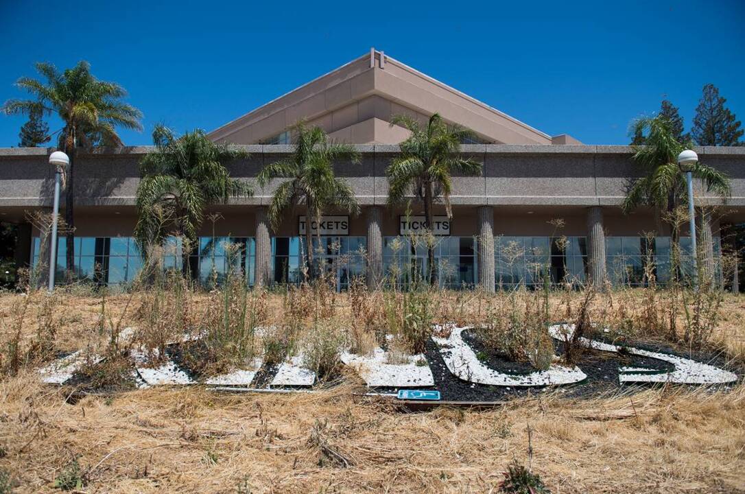 Weeds take over neglected Sleep Train Arena site