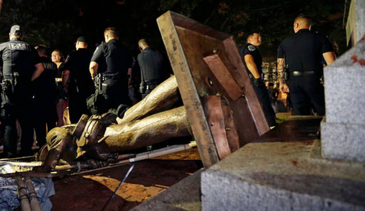 Group rallies as Silent Sam protesters, man who punched demonstrator appear in court