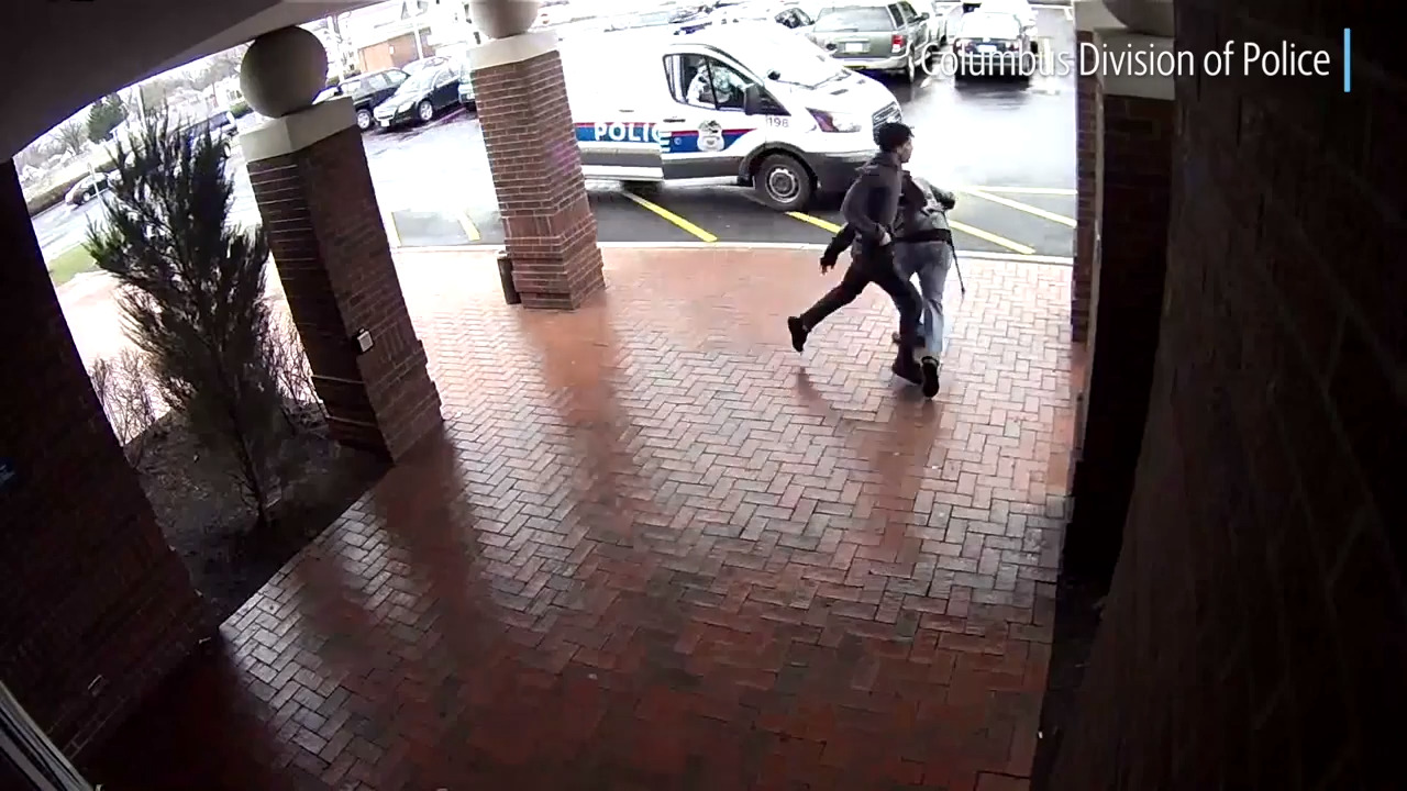 Watch library patron with cane use fancy footwork to help police nab armed suspect