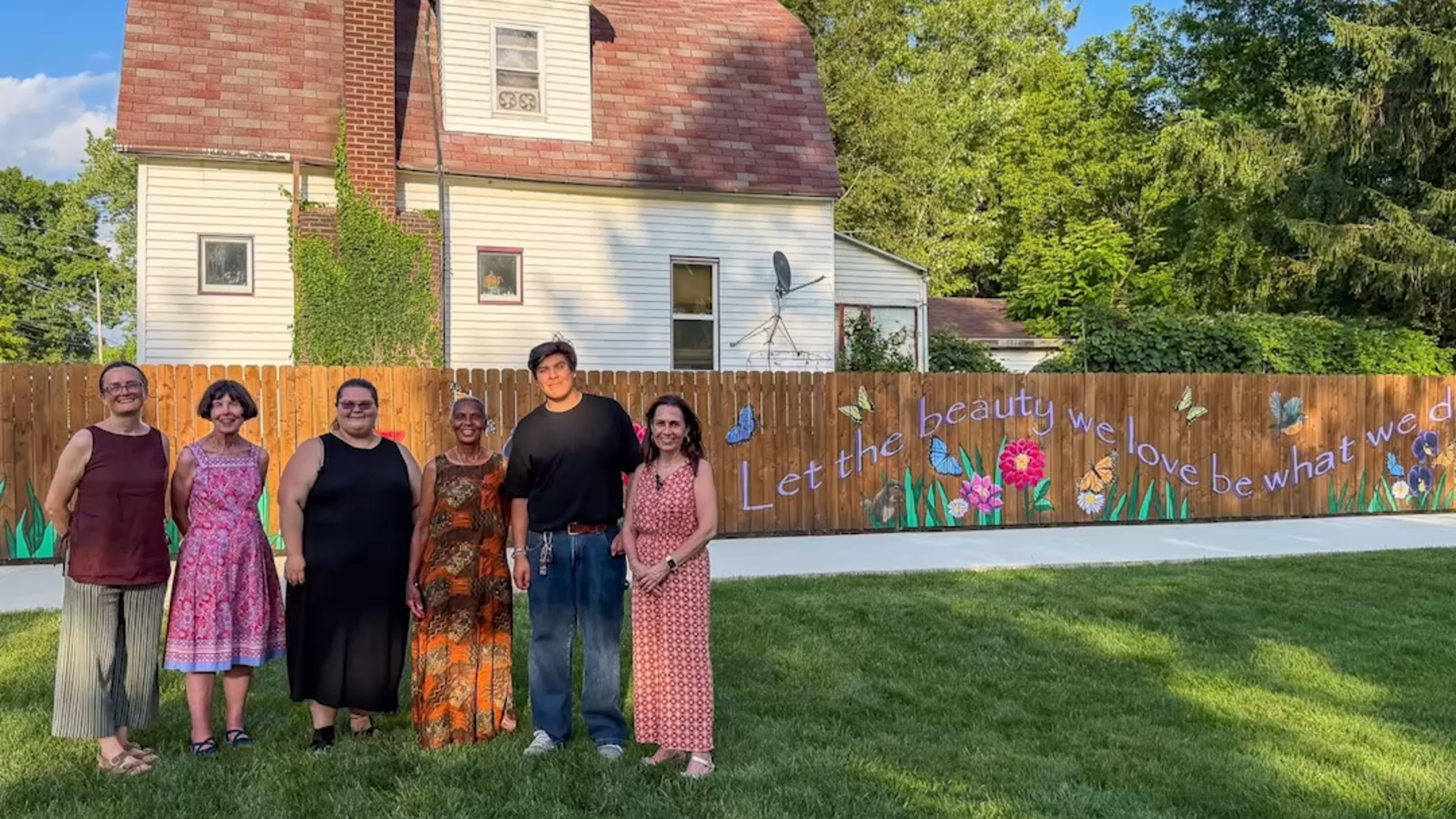 Youngstown State University art graduates create mural for Happy Place Sanctuary