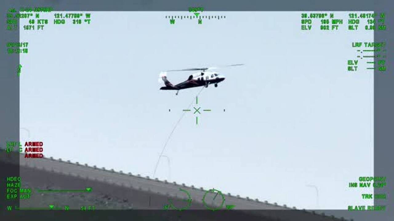 Blackhawk helicopters aid erosion repair at Oroville Dam emergency spillway