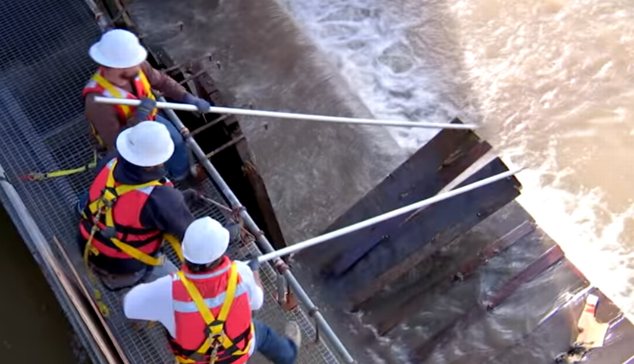 Watch crews closing gates to Sacramento Weir, and beautiful views of waterway