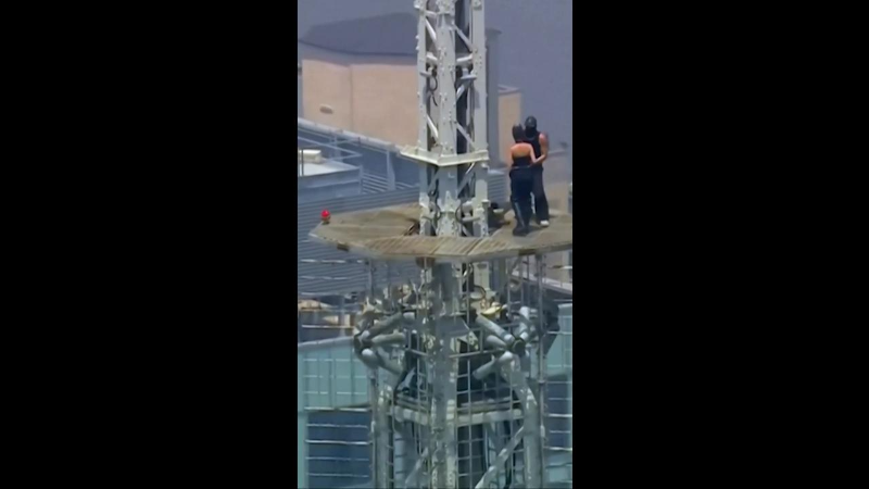 Couple climb Empire State building, appear to get engaged