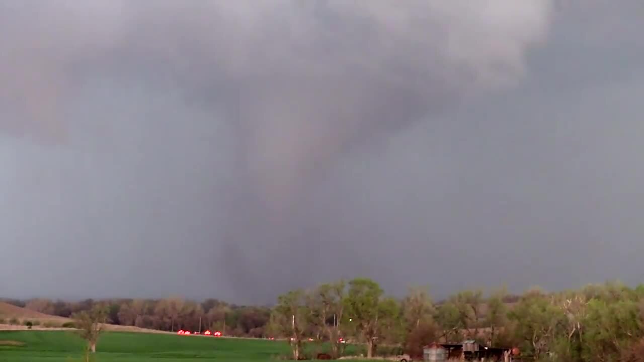 Watch as large tornado forms near I-70