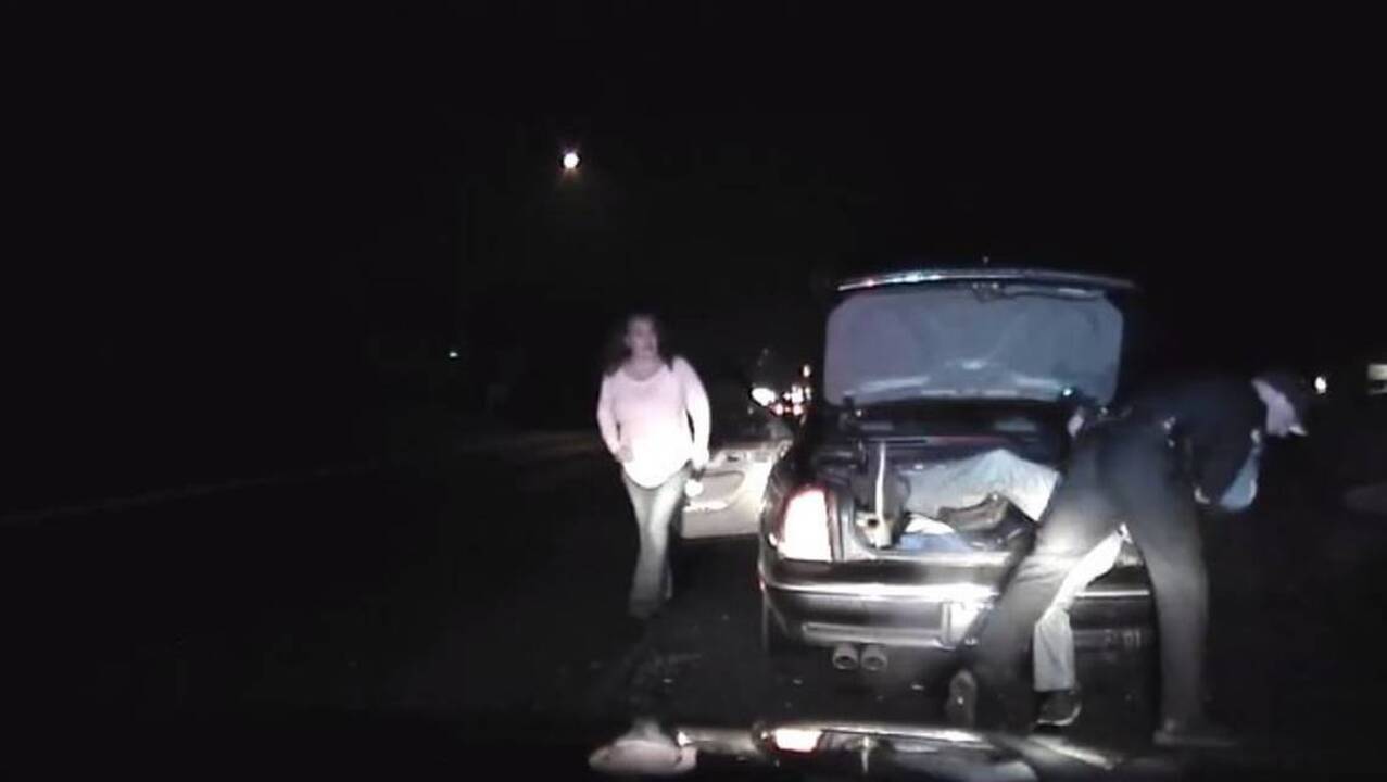 Traffic stop goes wild when fugitive leaps out of the trunk