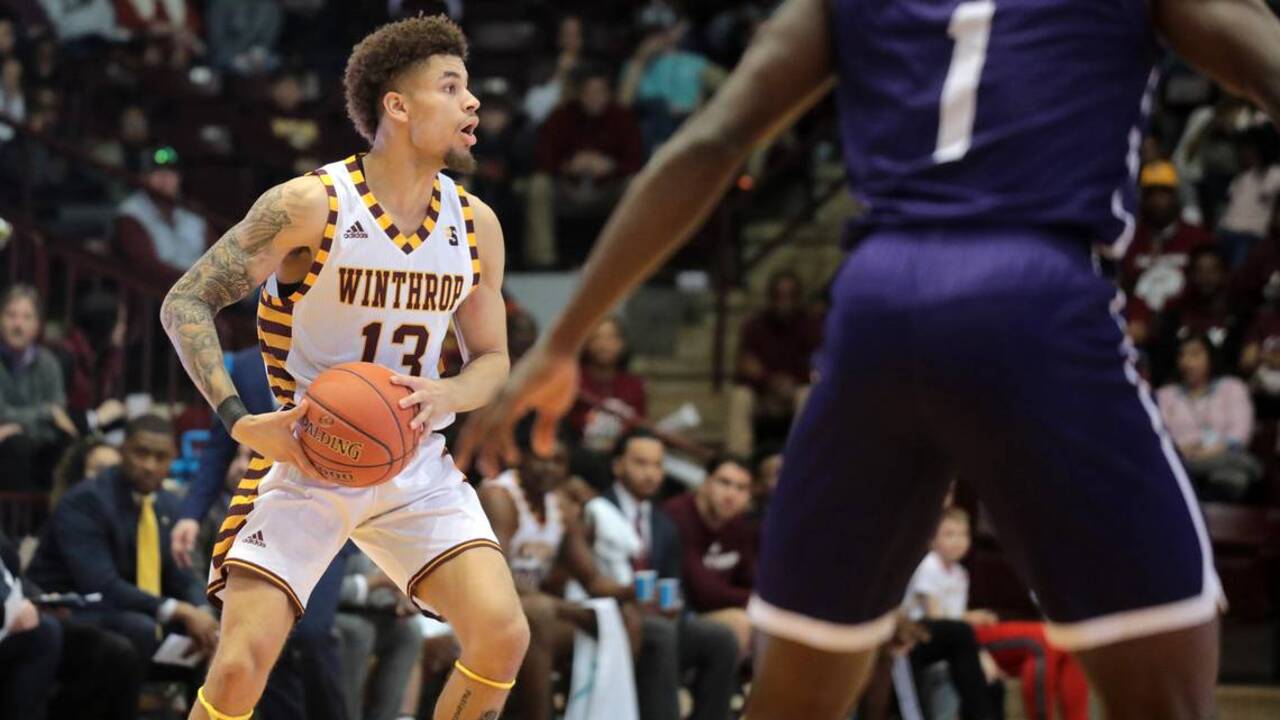 Winthrop’s Hunter Hale celebrates after Big South tournament win