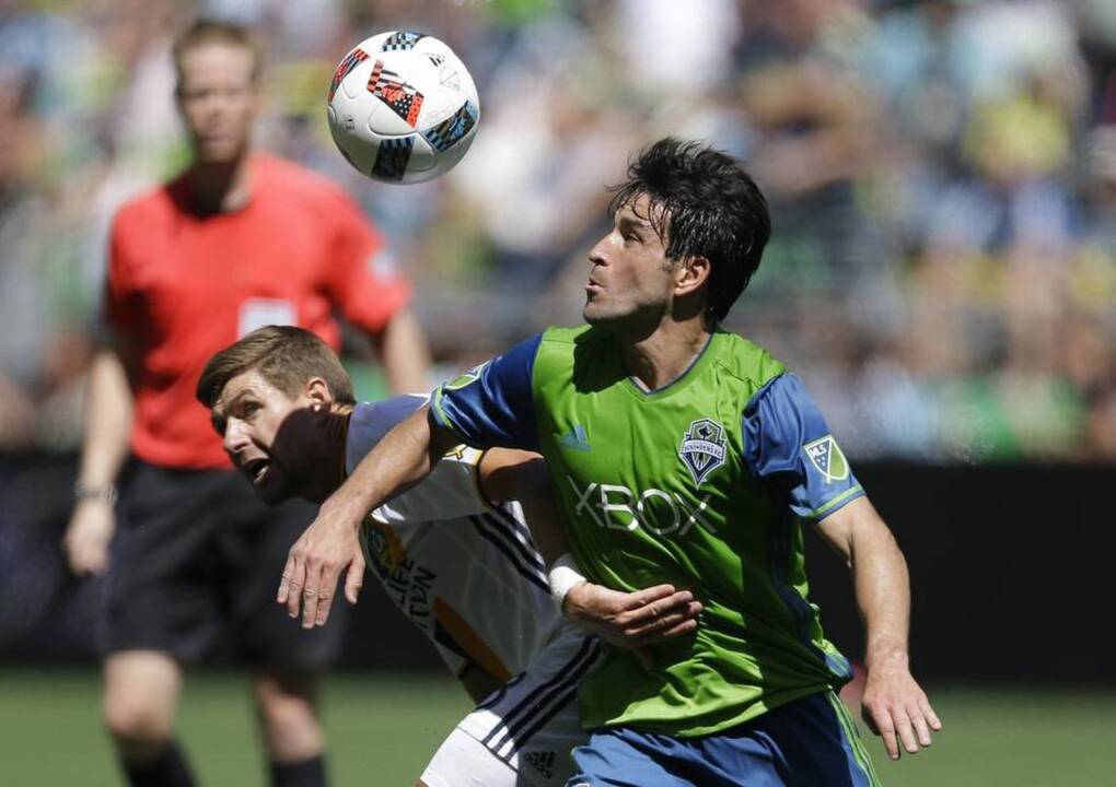 Sounders midfielder Nicolas Lodeiro answers questions after preseason training
