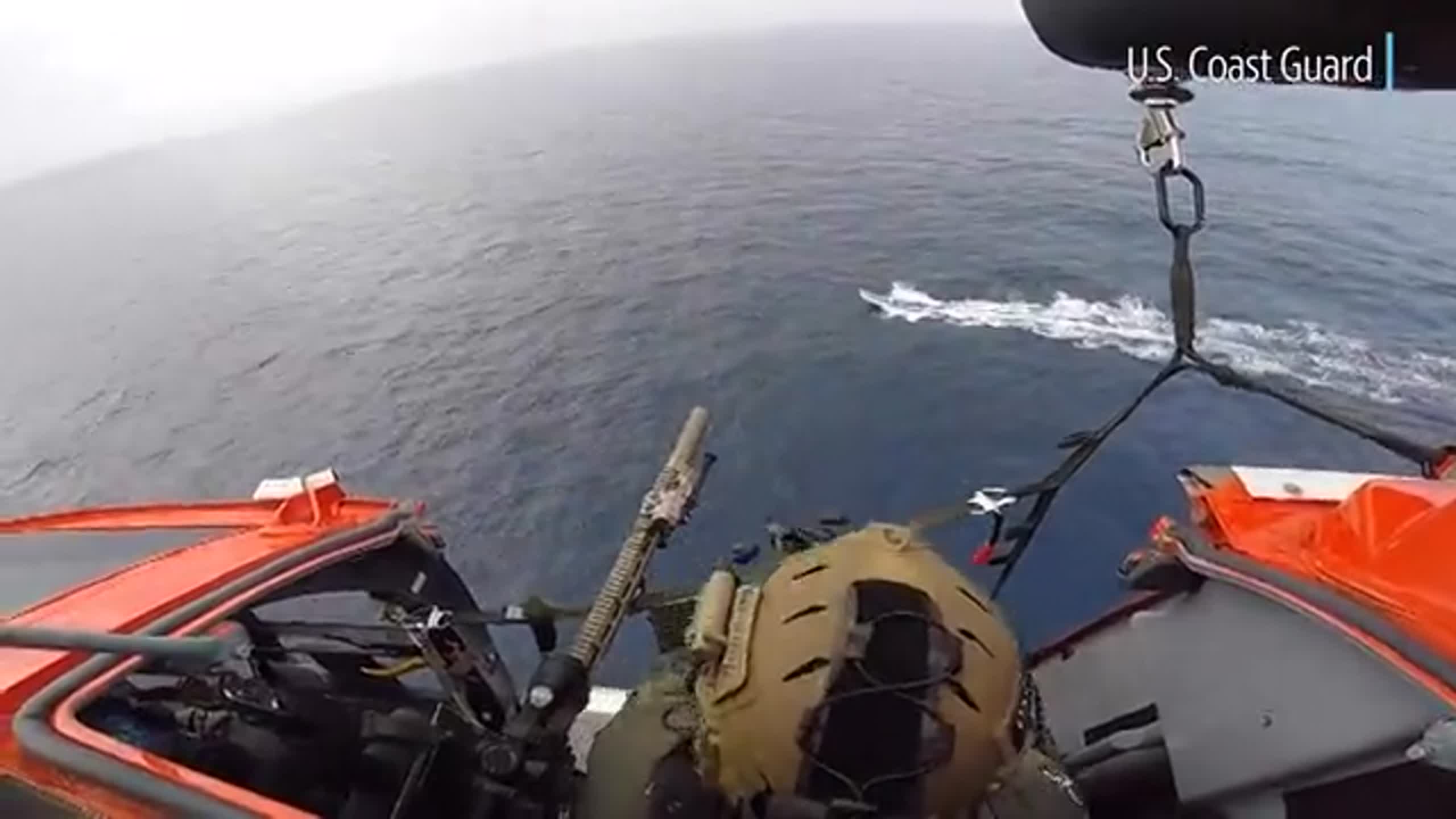 U.S. Coast Guard helicopter gunner shoots smuggling boat's engines