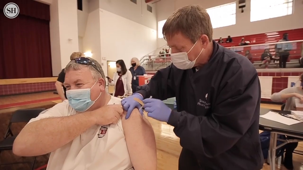 Nearly 200 Biloxi school teachers get COVID-19 vaccines