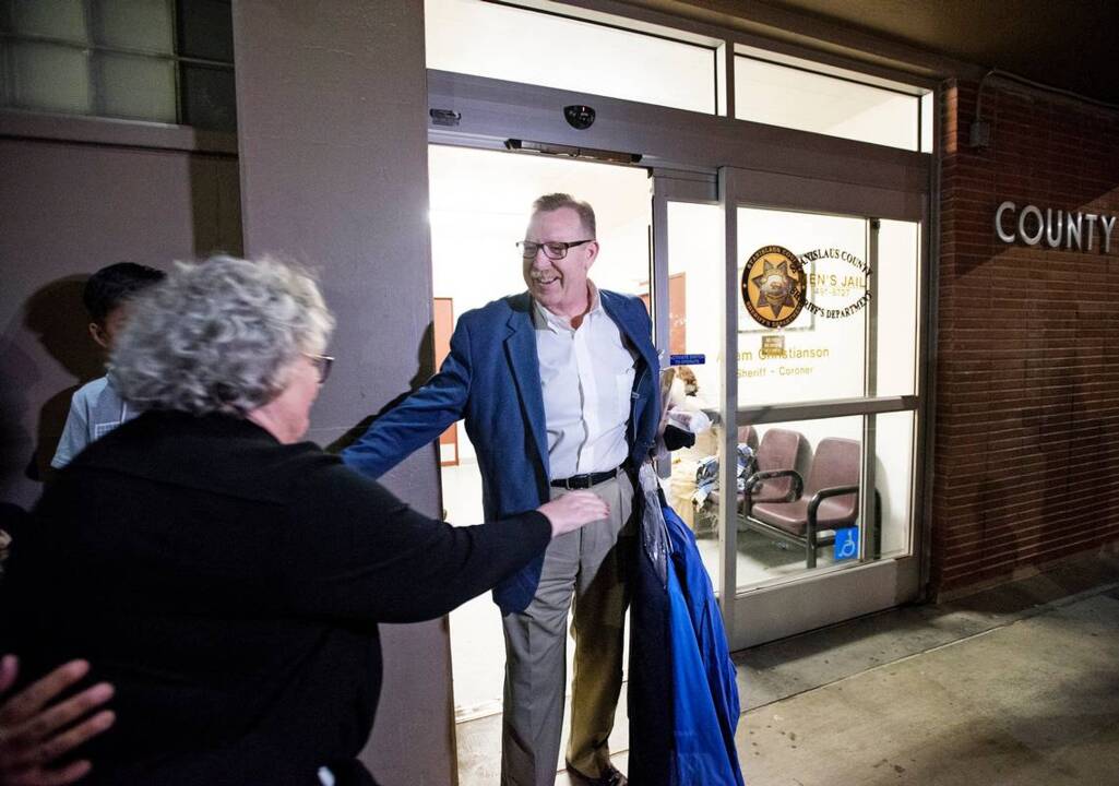 Frank Carson emerges from jail to cheers from family and friends