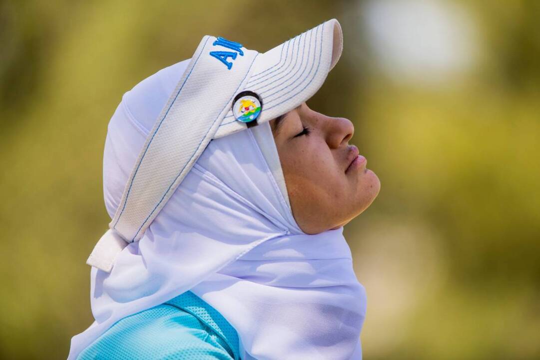 On a golf scholarship to Nebraska, she is also a practicing Muslim