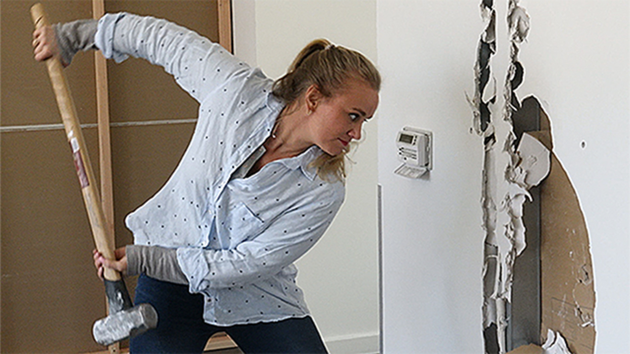 With the swing of a sledgehammer, HGTV’s Tamara Day kicks off a project to help kids and their families