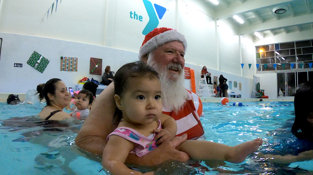 Experience Swim with Santa at Sacramento YMCA