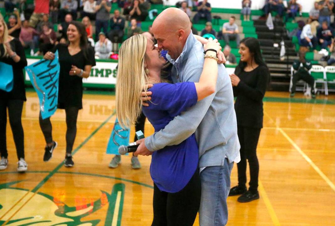 A surprise marriage proposal at Cary High School  