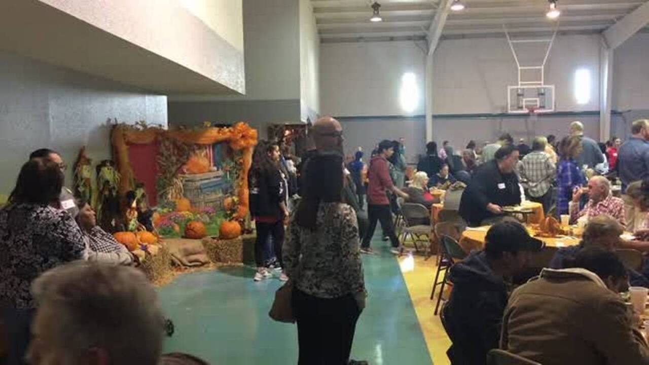 Nearly 1,000 residents line up for a free Thanksgiving Day meal