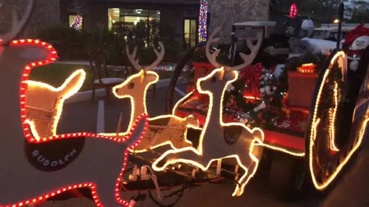 Annual golf cart parade lights up Bradenton neighborhood