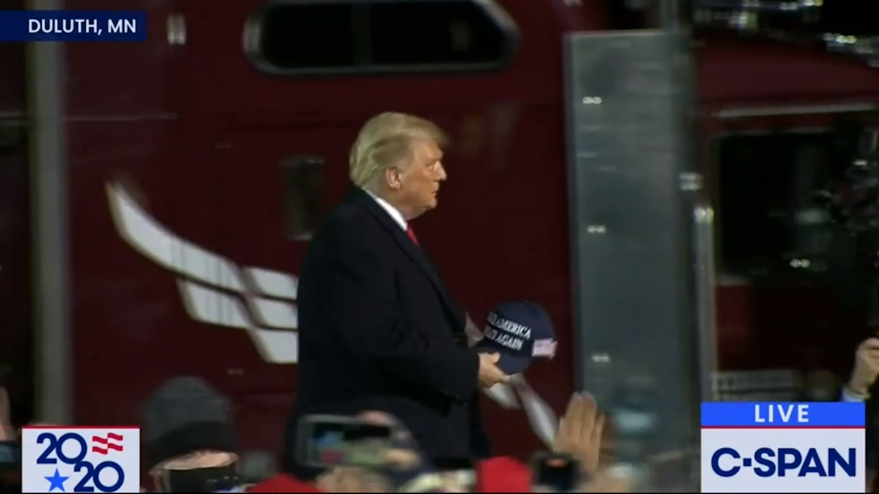 Trump tosses hats into Minnesota crowd day before COVID diagnosis