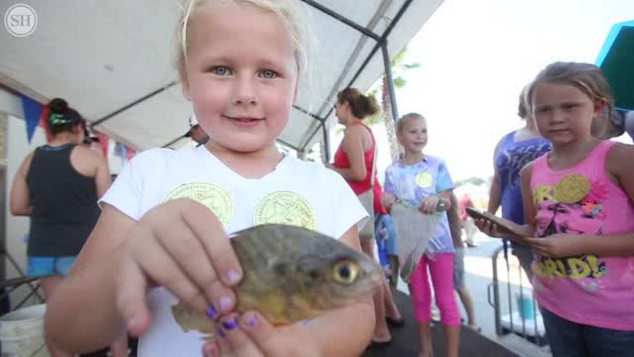 Young anglers bring in their catch at Kids Fishing Rodeo