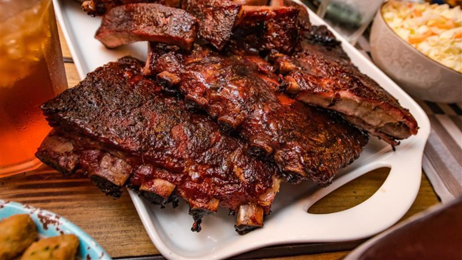 Ask the pitmaster at Dickey's Barbecue Pit: What's the best wood for smoking ribs?