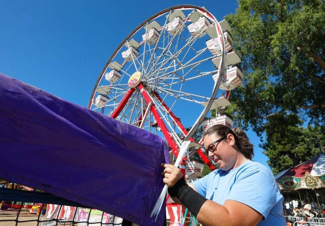 Last-minute prep for opening day at the Mid-State Fair