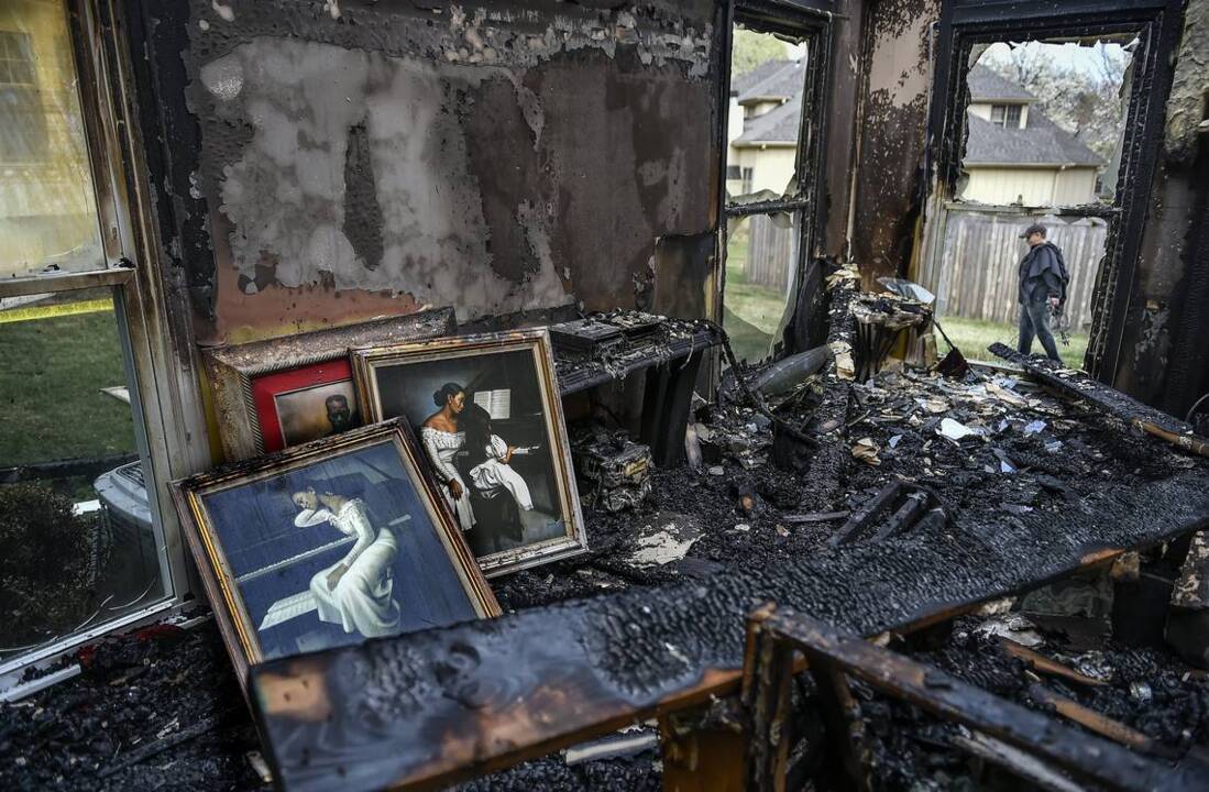 Overland Park woman returns to her burnt-out house near CityPlace development