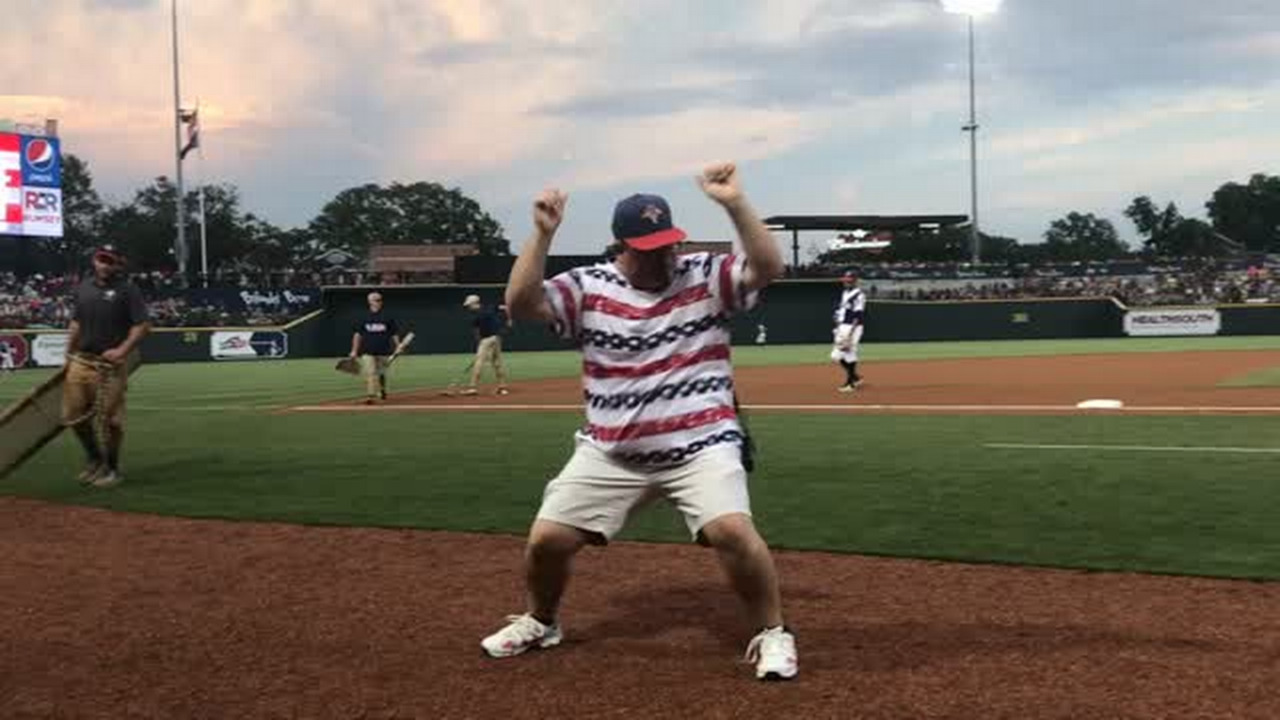 Fireflies' 'Fly Guys' dance during a between-innings entertainment period