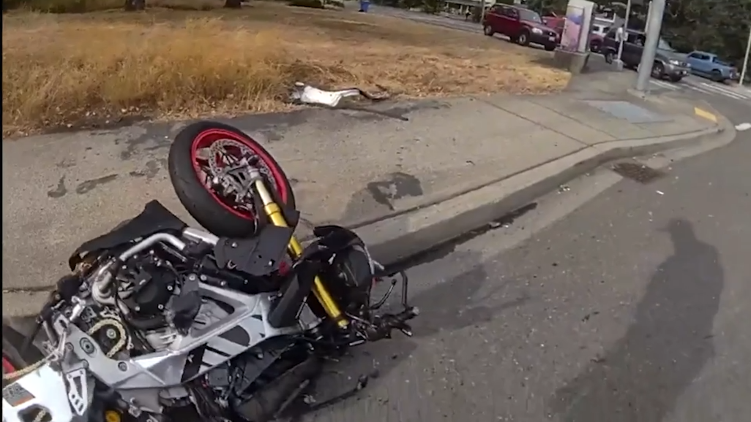 Motorcyclist dies after collision with large pickup truck